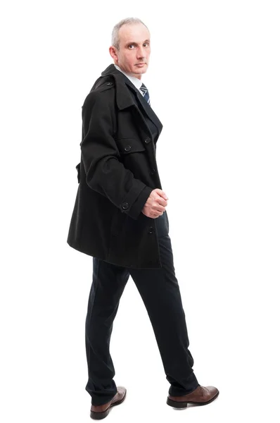 Full body of elegant man posing holding overcoat — Stock Photo, Image