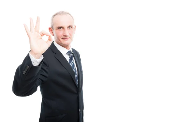 Portrait of aged elegant man showing okay gesture — Stock Photo, Image