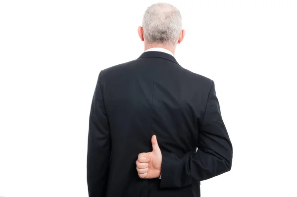 Back view of aged elegant man showing like gesture — Stock Photo, Image