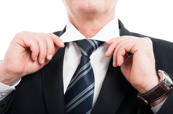 Close-up of senior man arranging his shirt — Stock Photo, Image