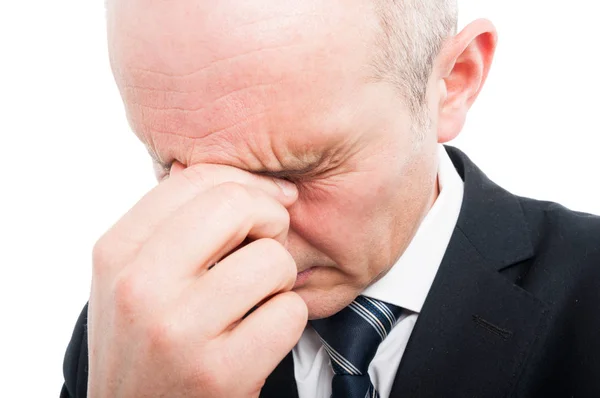 Close-up of senior corporate man thinking or having a problem — Stock Photo, Image