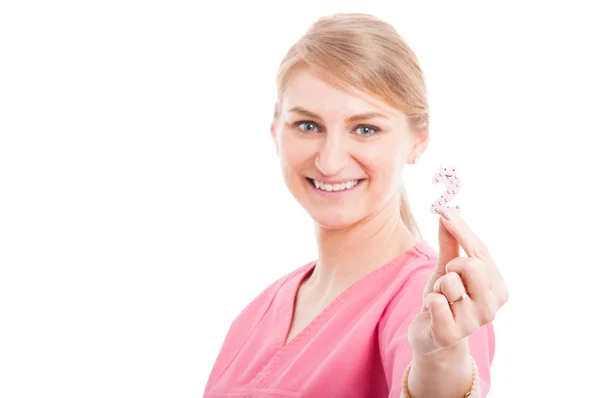 Selective focus of smiling pediatrician lady showing number two — Stock Photo, Image