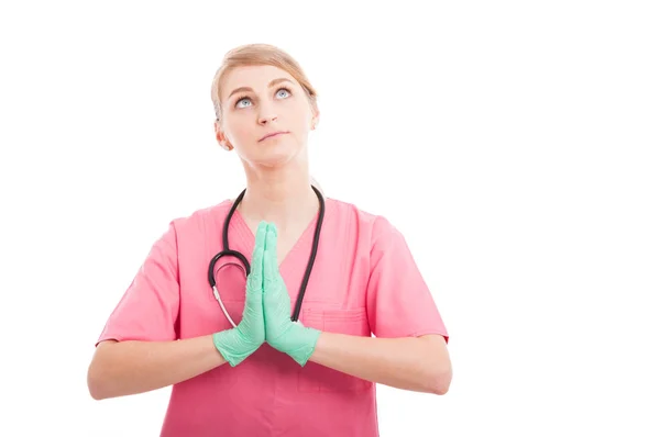 Ženské zdravotní sestra modlit a vyhledávání — Stock fotografie