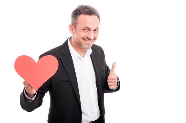 Excited handsome man doing like sign — Stock Photo, Image