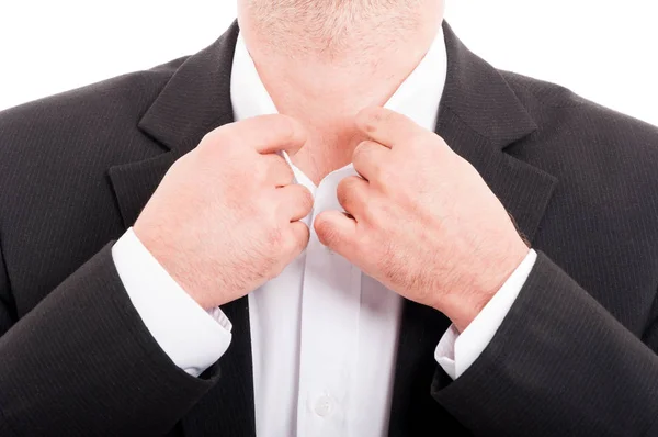 Closeup of man adjusting shirt collar — Stock Photo, Image