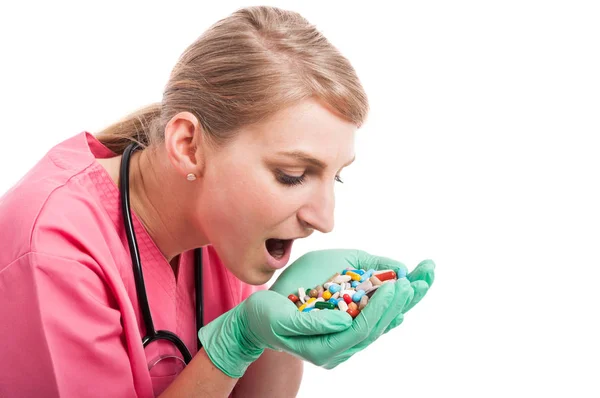 Close-up of medical nurse taking lots of pills — Stock Photo, Image