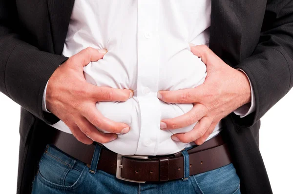 Hombre teniendo indigestión después de un almuerzo de negocios — Foto de Stock