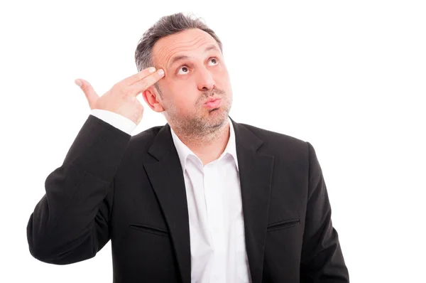 Portrait of young man pretending to shoot himself — Stock Photo, Image