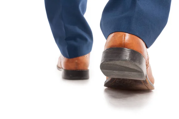 Closeup view of businessman shoes from behind — Stock Photo, Image