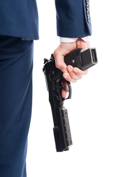 Geheim agent hand in close-up met geweer — Stockfoto