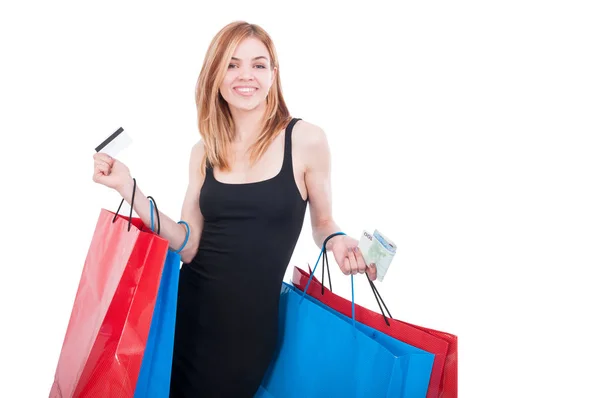 Woman with shopping bags and credit card Stock Photo