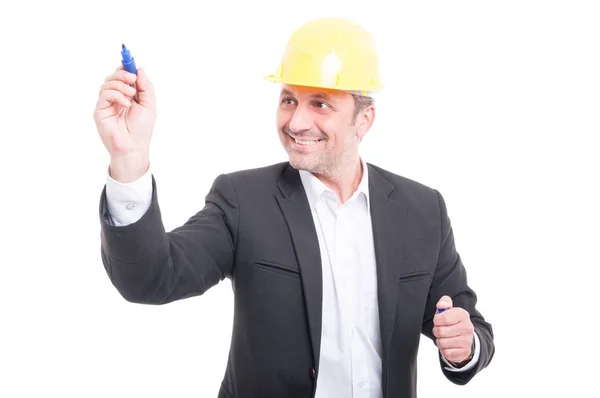 Arquitecto usando escritura hardhat con marcador —  Fotos de Stock