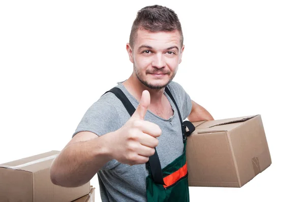 Рушійний хлопець тримає картонну коробку, показуючи, як — стокове фото