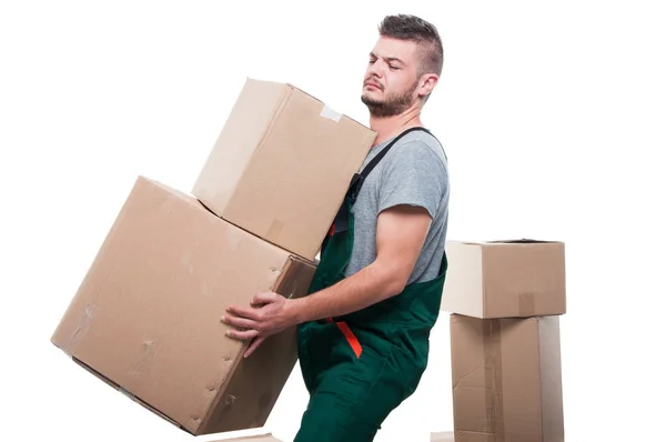 Mover ragazzo che trasporta due scatole pesanti — Foto Stock