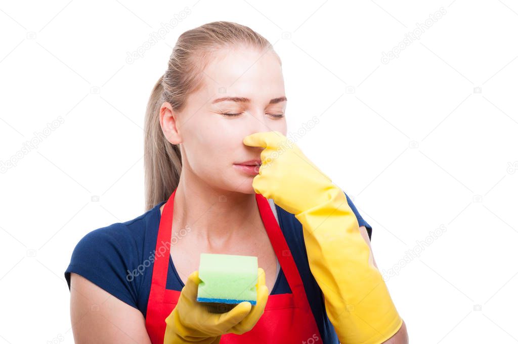 Housewife plugging her nose because of bad smell 