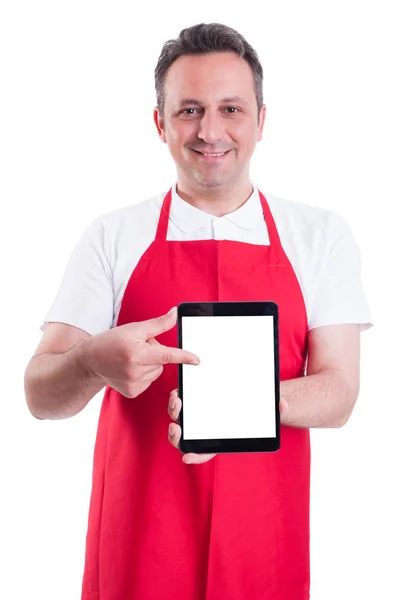 Vendedor de supermercado moderno celebración de tabletas en blanco —  Fotos de Stock