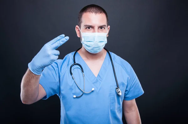 Portrait of proctolog wearing latex gloves gesturing procedure — Stock Photo, Image