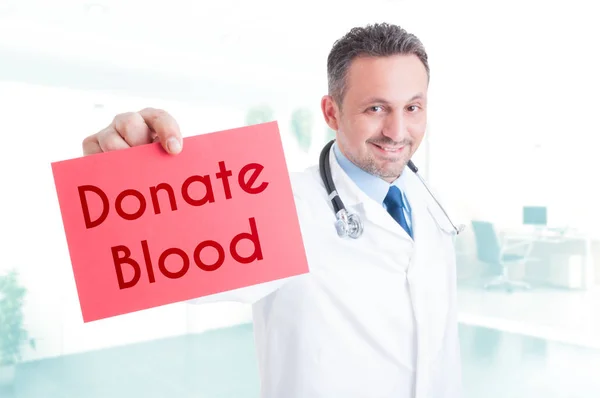 Medical specialist promoting blood donation — Stock Photo, Image