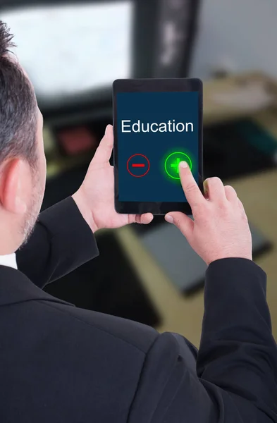 Successful bussinesman with tablet support education
