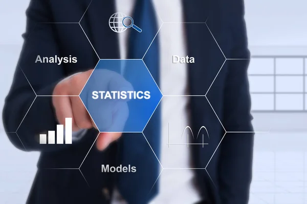 Geschäftsmann zeigt Statistik-Ikone an — Stockfoto