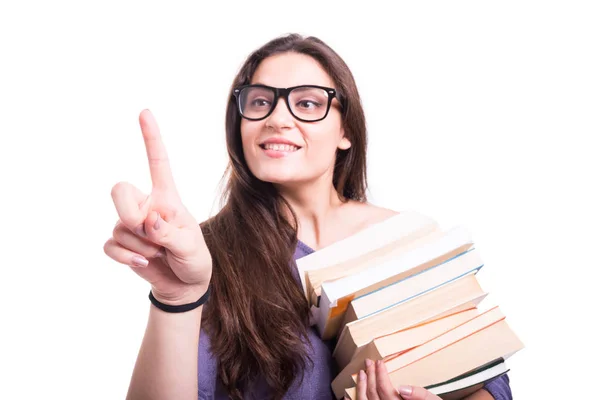 Happy beautiful girl reader pointing on screen — Stock Photo, Image