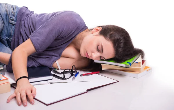 Student falling asleep on her books — Stock Photo, Image
