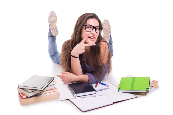 Sexy girl student doing homework and lying down — Stock Photo, Image