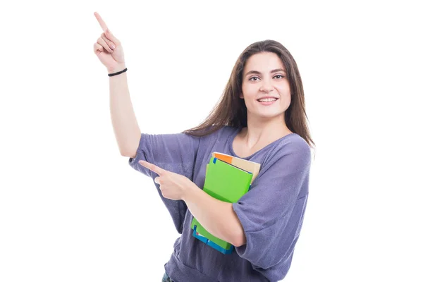 Jonge student meisje met boeken geïsoleerd op wit — Stockfoto