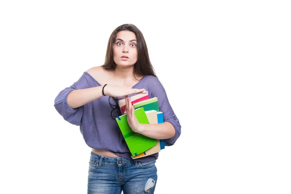 Student with a lot of books looking despair Stock Image