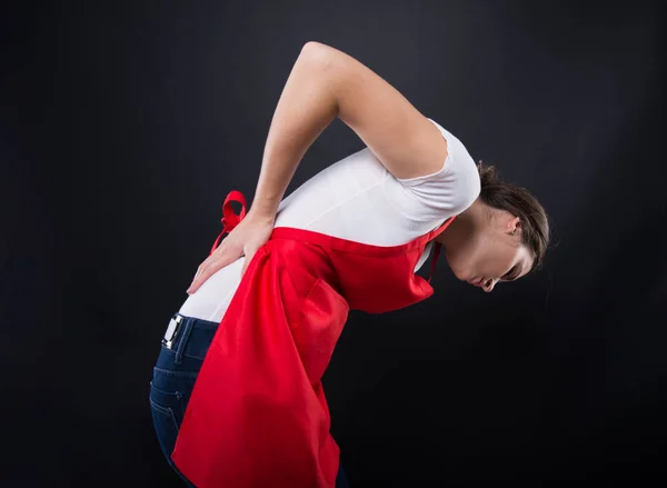 Funcionário feminino com dor na cintura — Fotografia de Stock