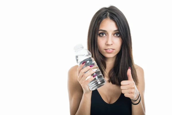 Portrét fit dívka drží vodu střevíc jako — Stock fotografie