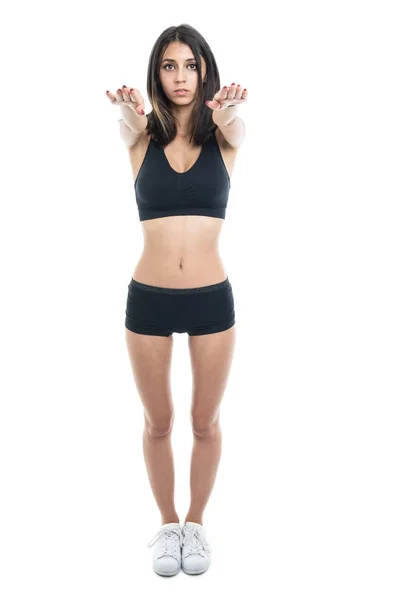 Pieno corpo di ragazza in forma in piedi facendo squat — Foto Stock