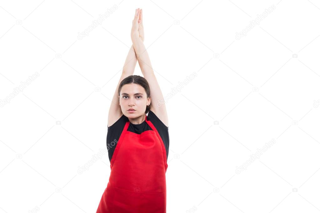 Beautiful girl employee stretching her arms 