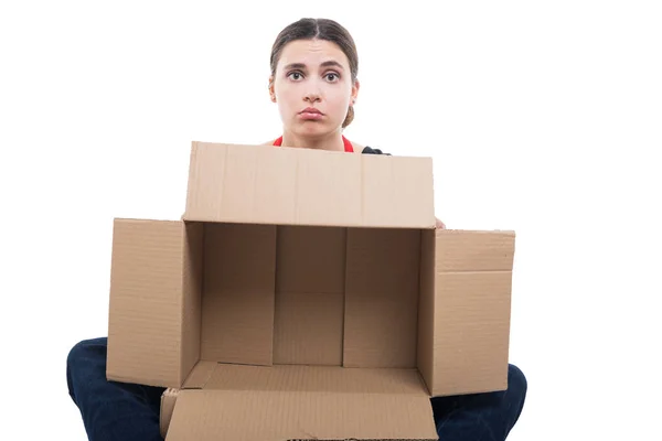 Unhappy woman employee holding empty box — Stock Photo, Image