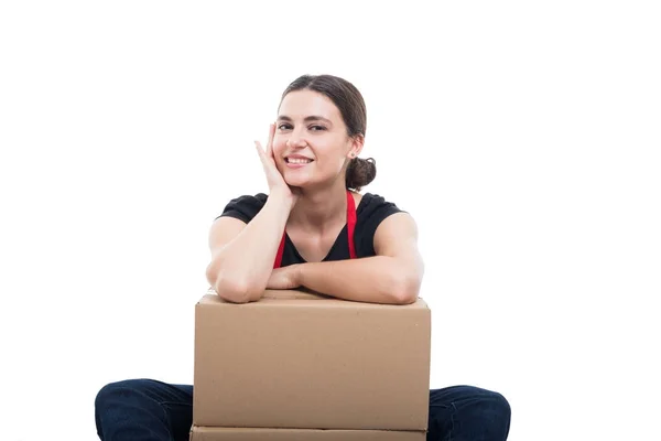 Pretty girl seller posing with cardboard boxes — Stock Photo, Image