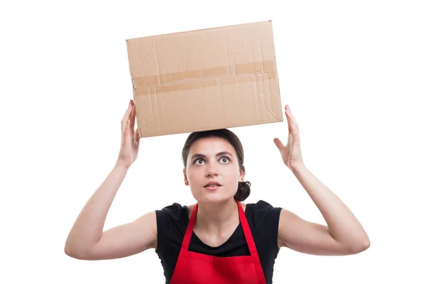 Portrait of beautiful employee holding box on head — Stock Photo, Image