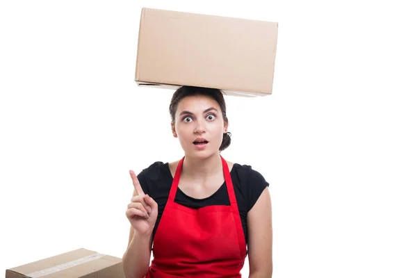 Young woman employee carrying cardboard box — Stock Photo, Image