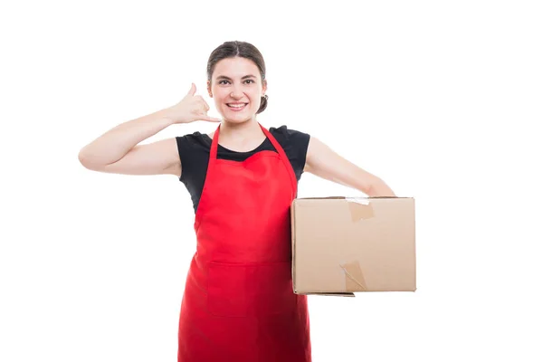 Beautiful seller woman holding box in her hands — Stock Photo, Image