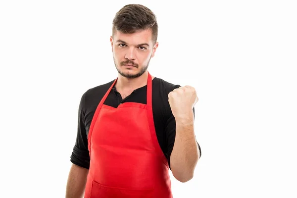 Male supermarket employer holding fist looking mad — Stock Photo, Image