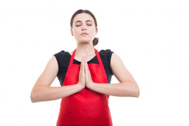 Genç kadın satıcı sıktı elleri dua ile 