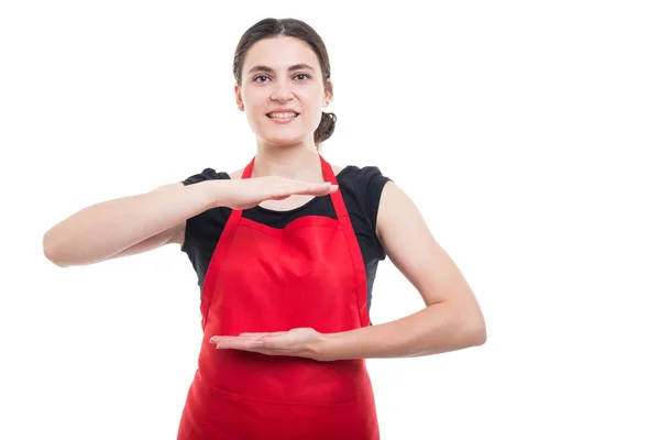 Mujer de ventas mostrando algo invisible en las manos —  Fotos de Stock