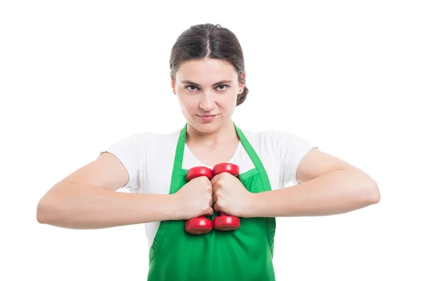 Mercader femenina haciendo ejercicio con mancuerna — Foto de Stock