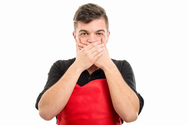 Male supermarket employer covering mouth like not speaking — Stock Photo, Image