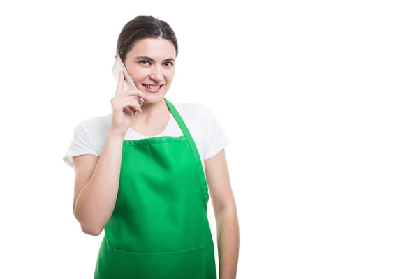 Successful female clerk making a call — Stock Photo, Image