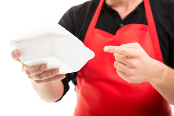 Zbliżenie: mężczyzna supermarket pracodawca wskazuje pudełko na lunch — Zdjęcie stockowe