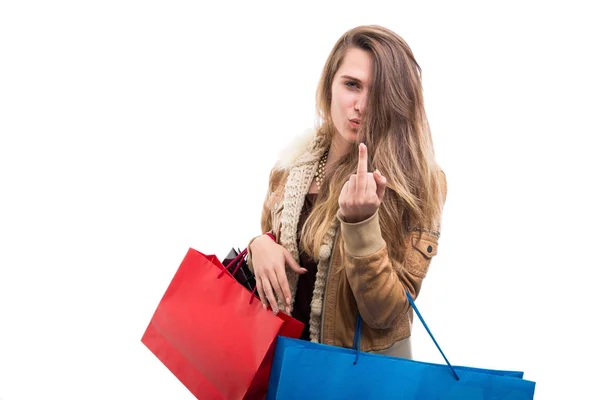 Rude hipster fashion girl doing obscene gesture — Stock Photo, Image