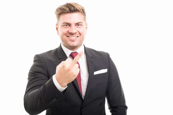 Portrait of handsome corporate business man showing middle finge — Stock Photo, Image