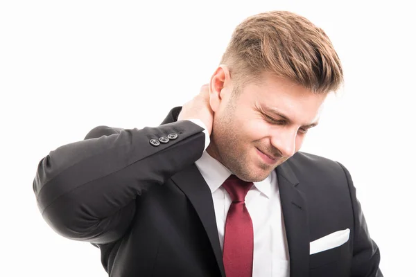 Business man standing holding neck like hurting — Stock Photo, Image