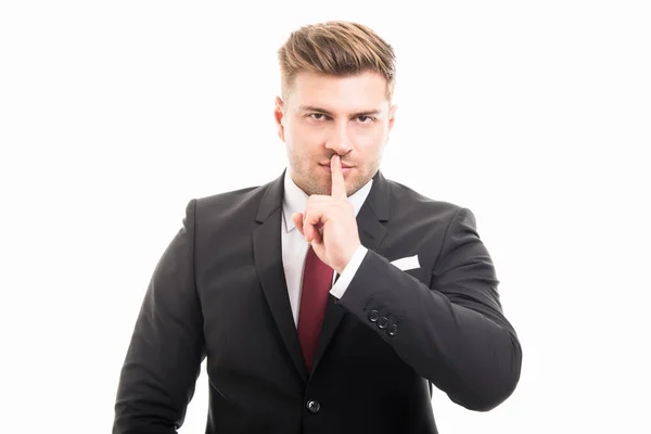 Stilig affärsman som visar tyst gest — Stockfoto