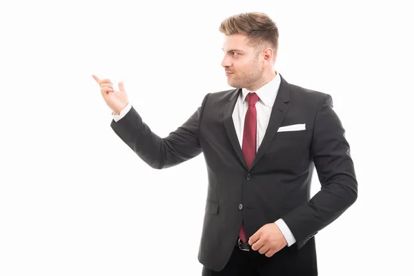 Handsome business man showing copyspace area — Stock Photo, Image